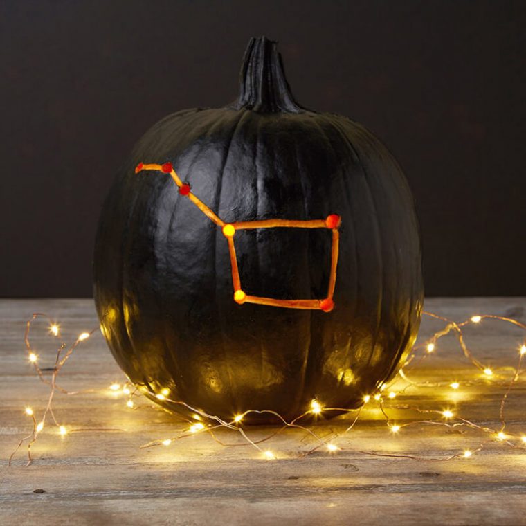 pumpkin with big dipper carved into it