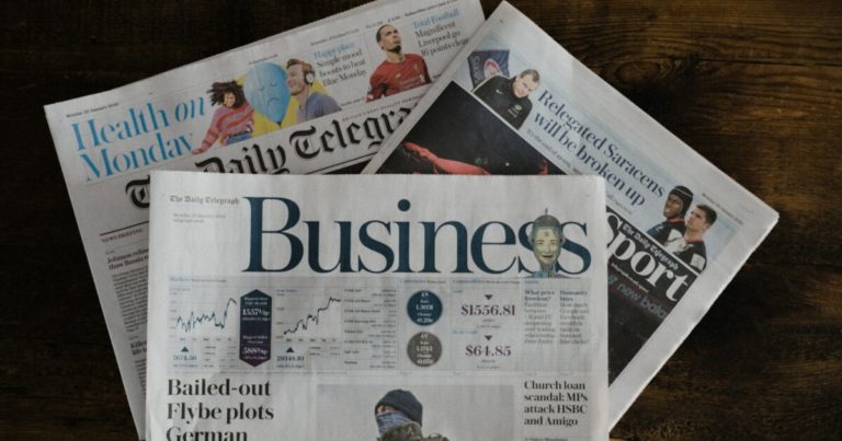 8 Excellent Ways to Use Newspaper in Your Garden - Featured image