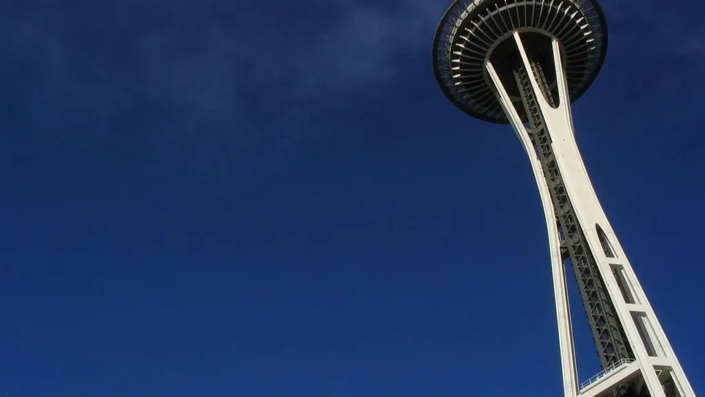 Two Daredevils Parachute From Space Needle, Police Hunt Them - Featured image