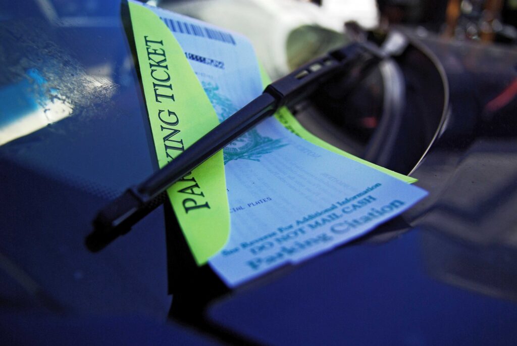 The Fake Parking Ticket Left on Windshields That's Actually a Scam - Featured image
