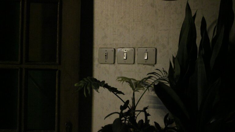Why Light Switches in Old Homes Sit So High on the Wall - Featured image
