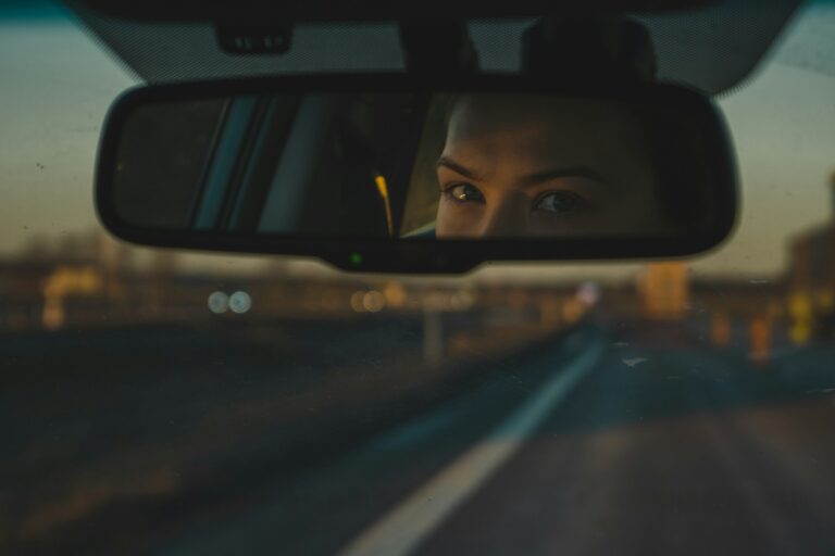 The Little Tab Under Your Rearview Mirror Most Drivers Never Use - Featured image